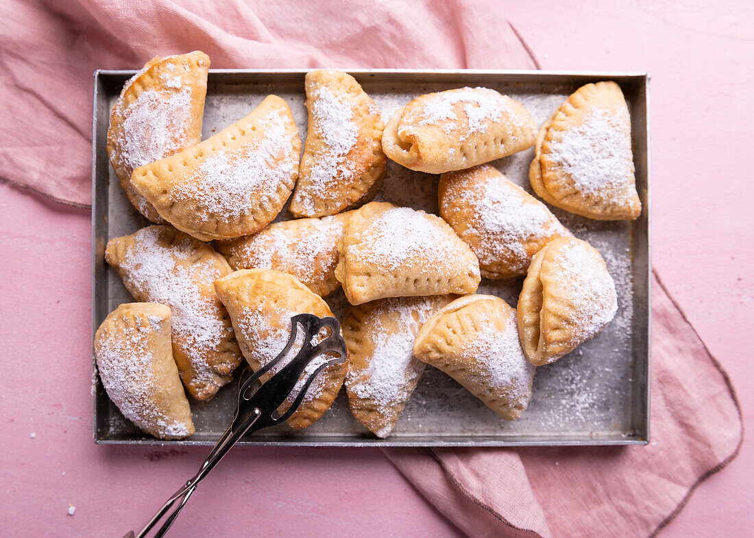 Vegan apple turnovers dusted with icing sugar