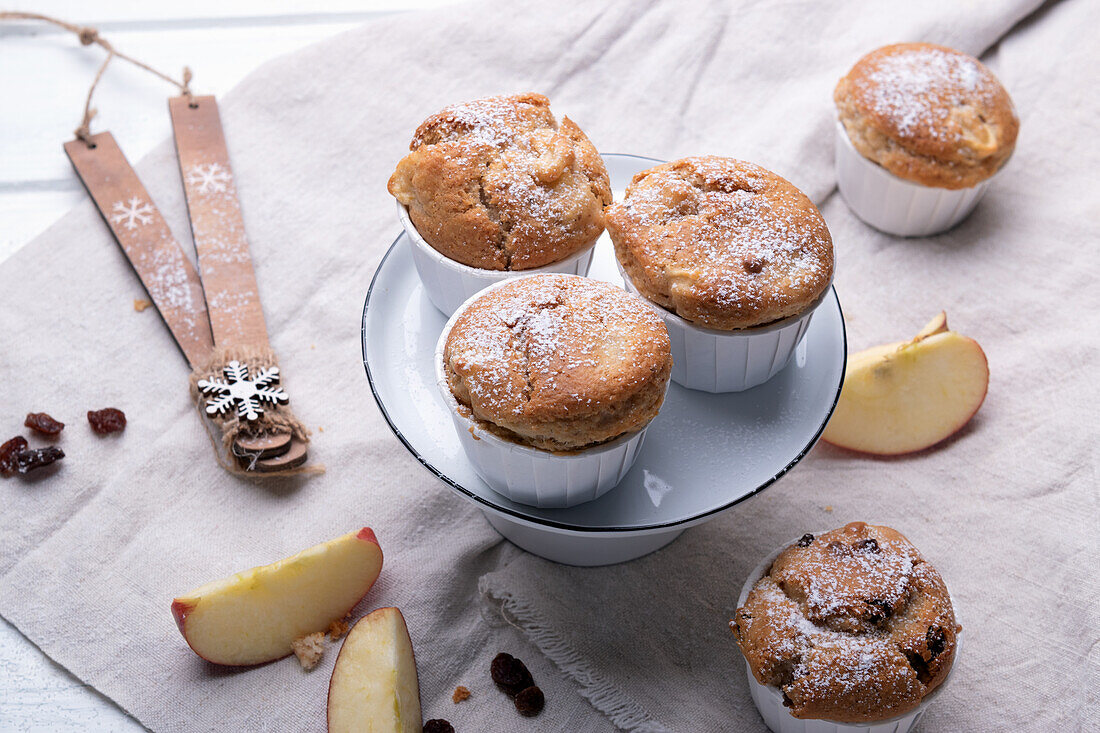 Vegan baked apple muffins with marzipan and raisins