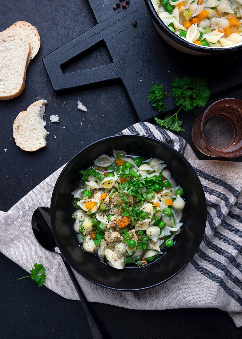 Vegan noodle soup with garden vegetables