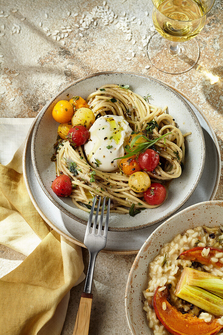 Onion pasta with cherry tomato confit and burrata