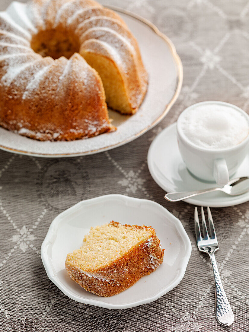 Bundt cake and a cup of cappuccino