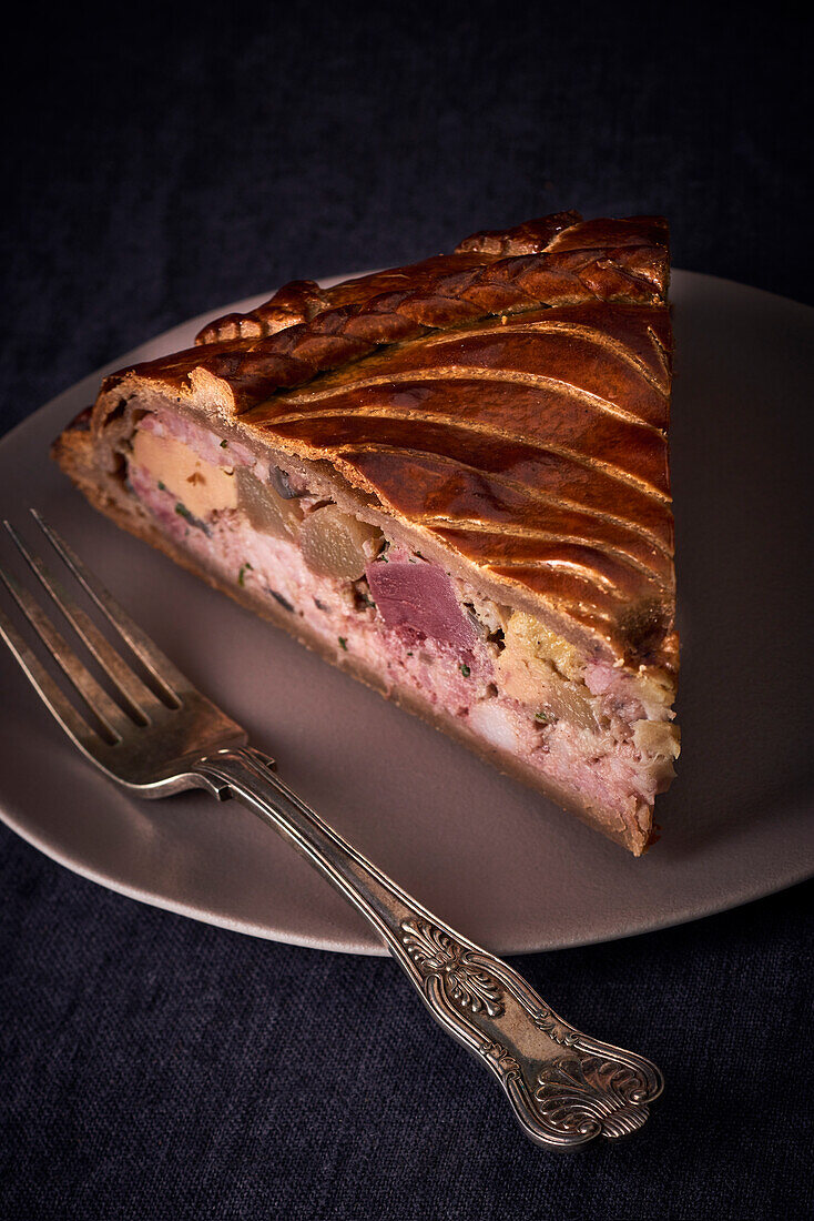 A piece of savory pithivier