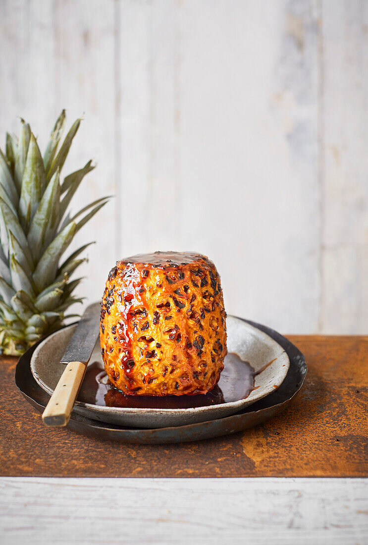 Whole roasted pineapple in spiced caramel