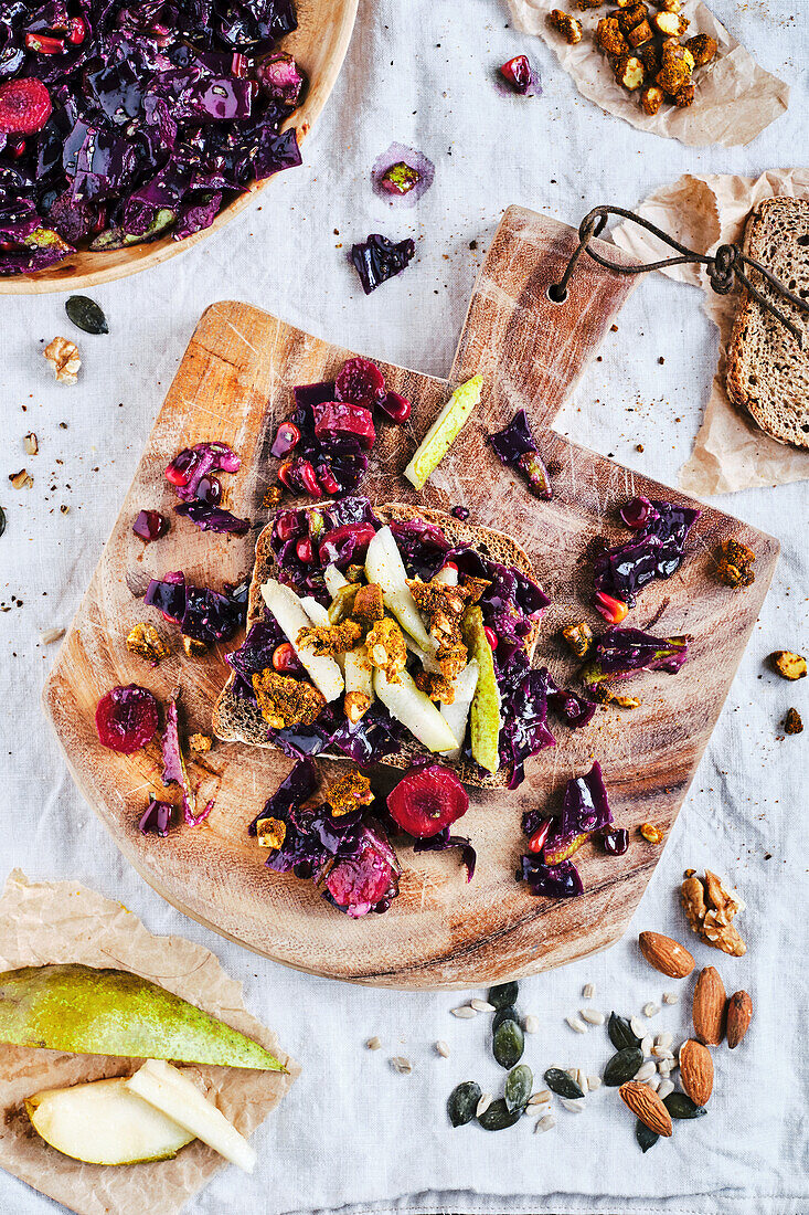 Chai red cabbage on toasted bread with caramelized seeds