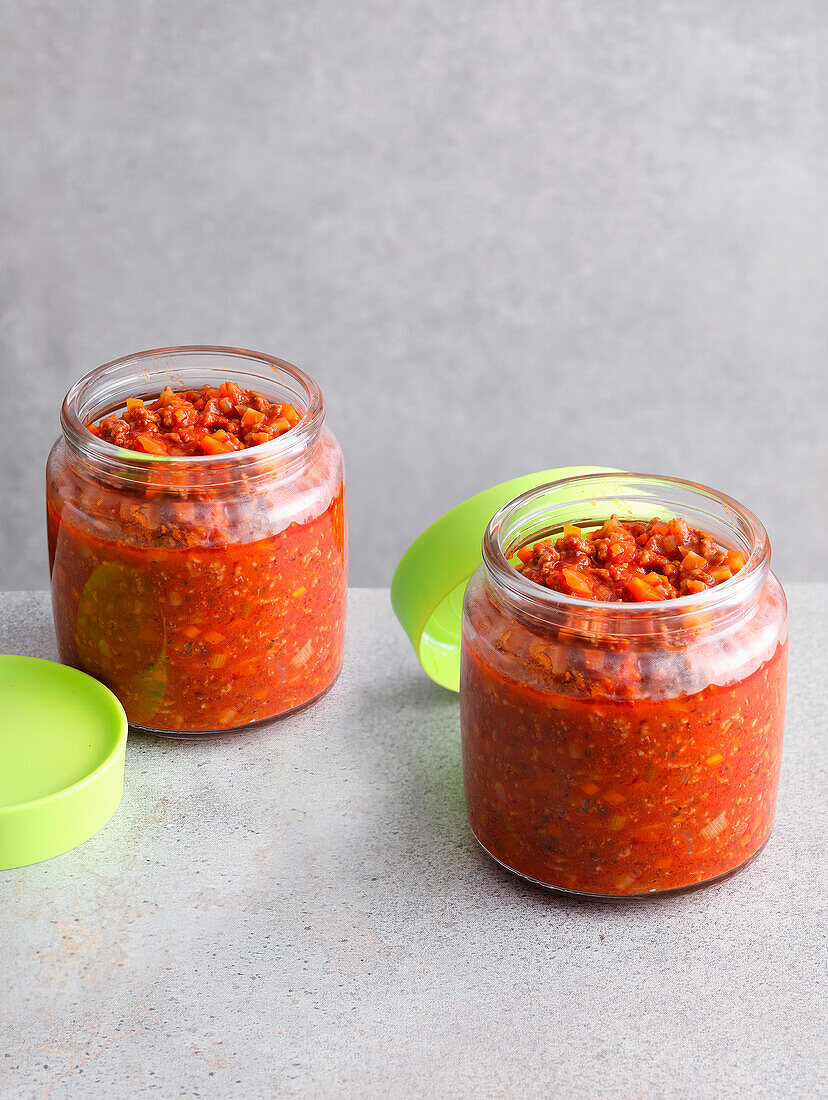 Homemade minced meat sauce (sugo) in jars