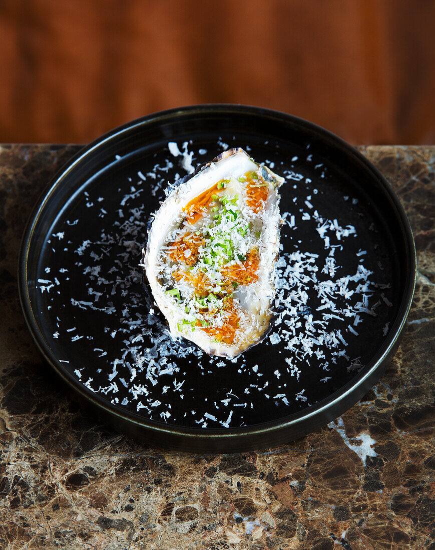 An oyster with coconut