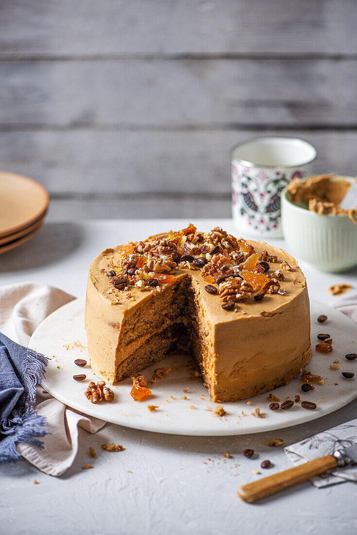 Coffee cake with walnuts, pecan praline and coffee butter icing