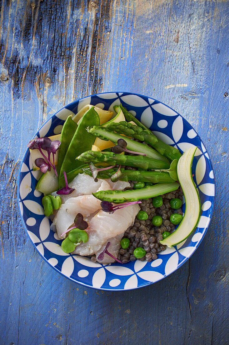 Bream with green asparagus on fregola pasta
