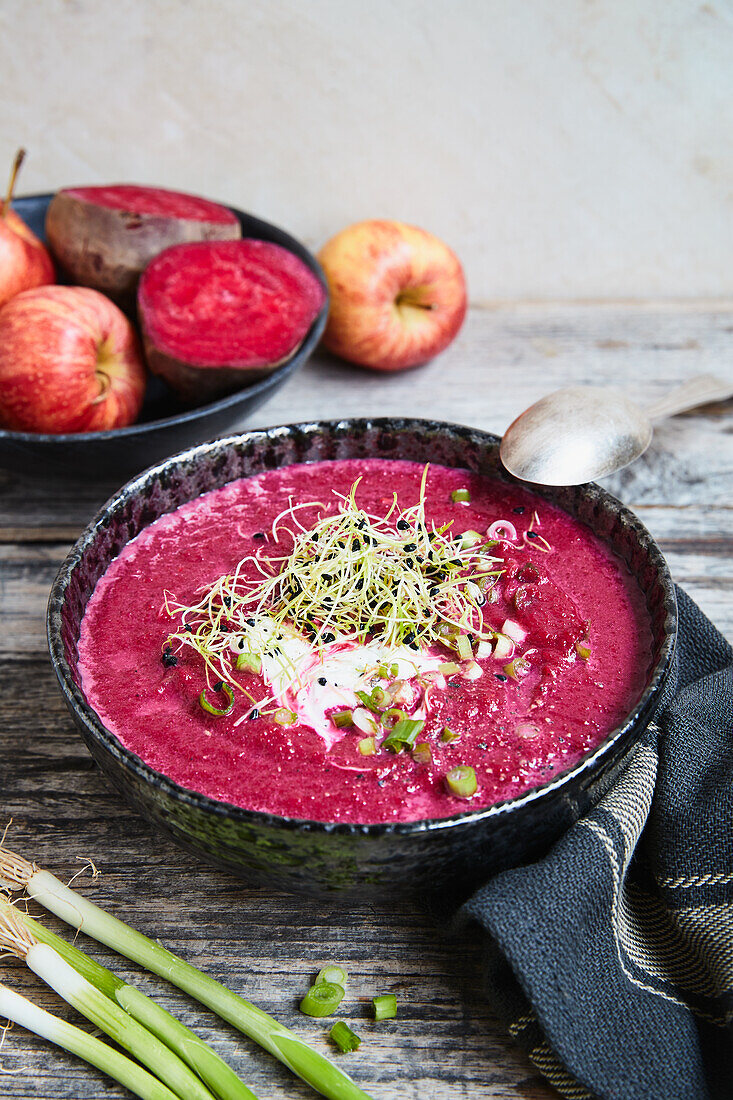 Beetroot soup with bean sprouts