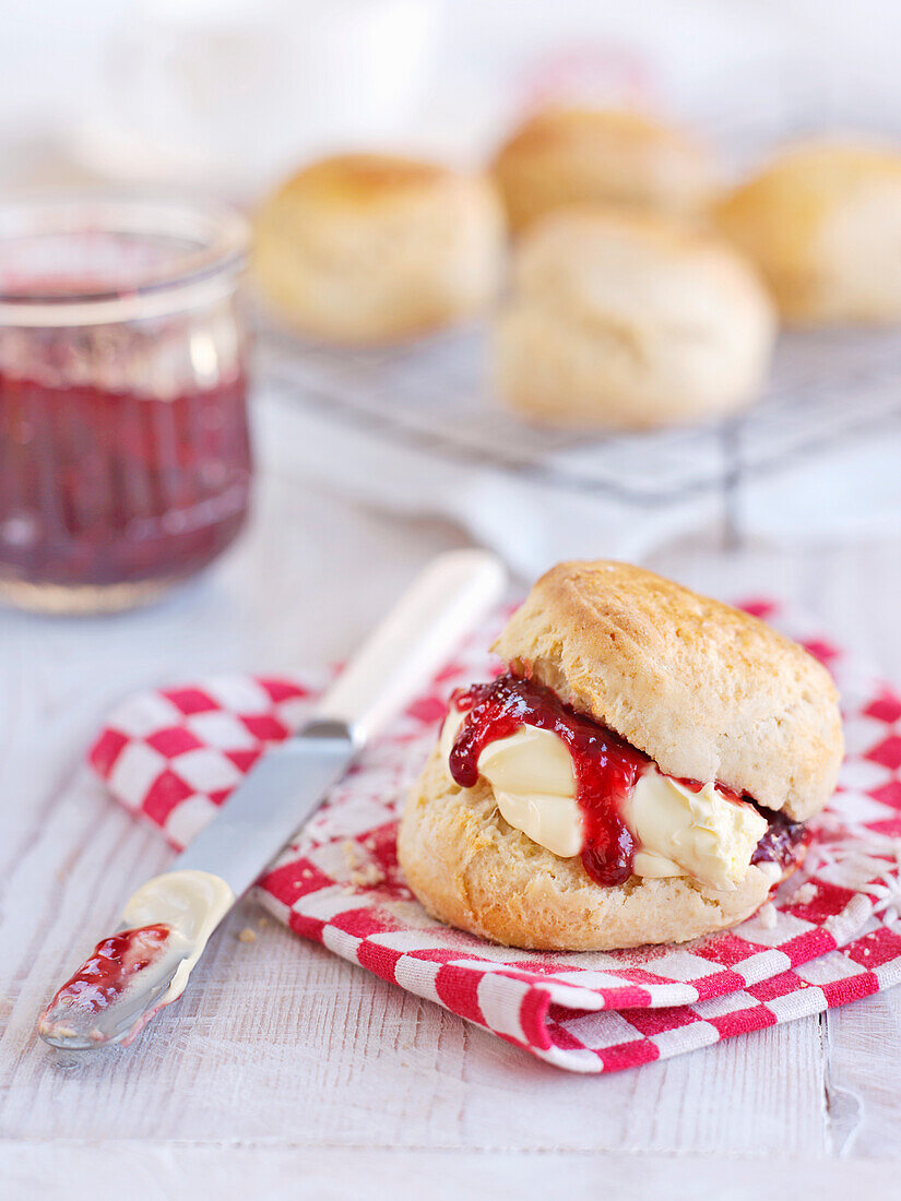 Fluffy scones with clotted cream and jam