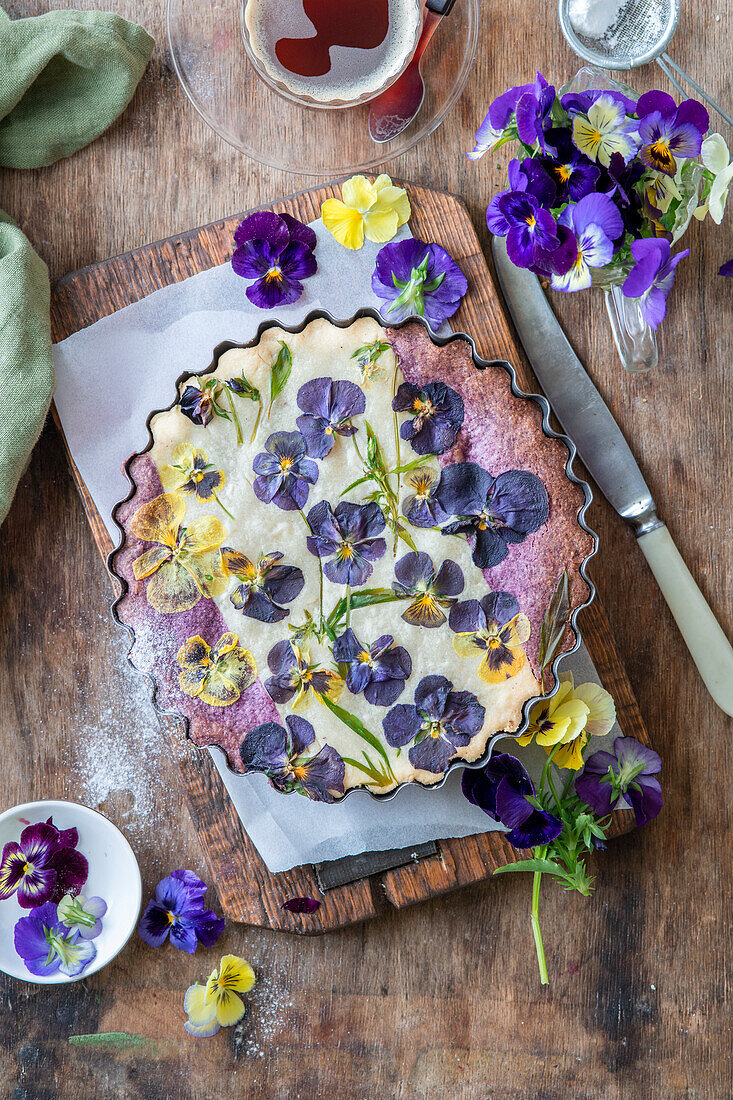 Viola pie - pressed violas into pastry, half of the pastry with freeze dried berry powder