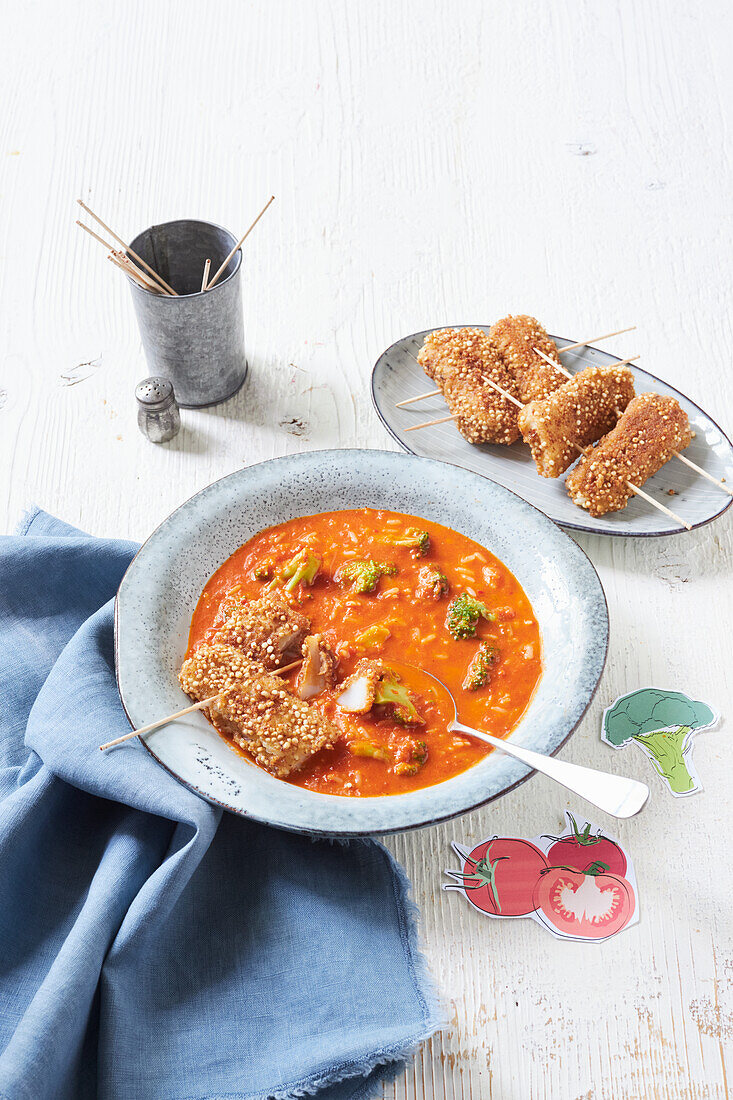 Tomato soup with fish finger skewers