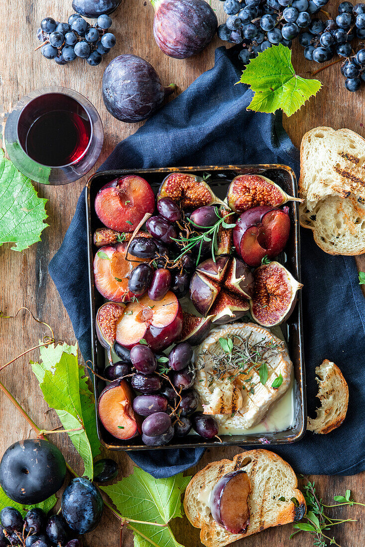 Baked autumn fruits with camembert cheese