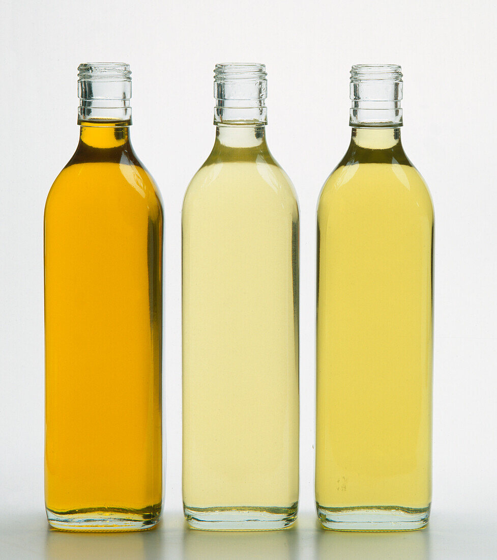 Bottles of oils including mustard oil