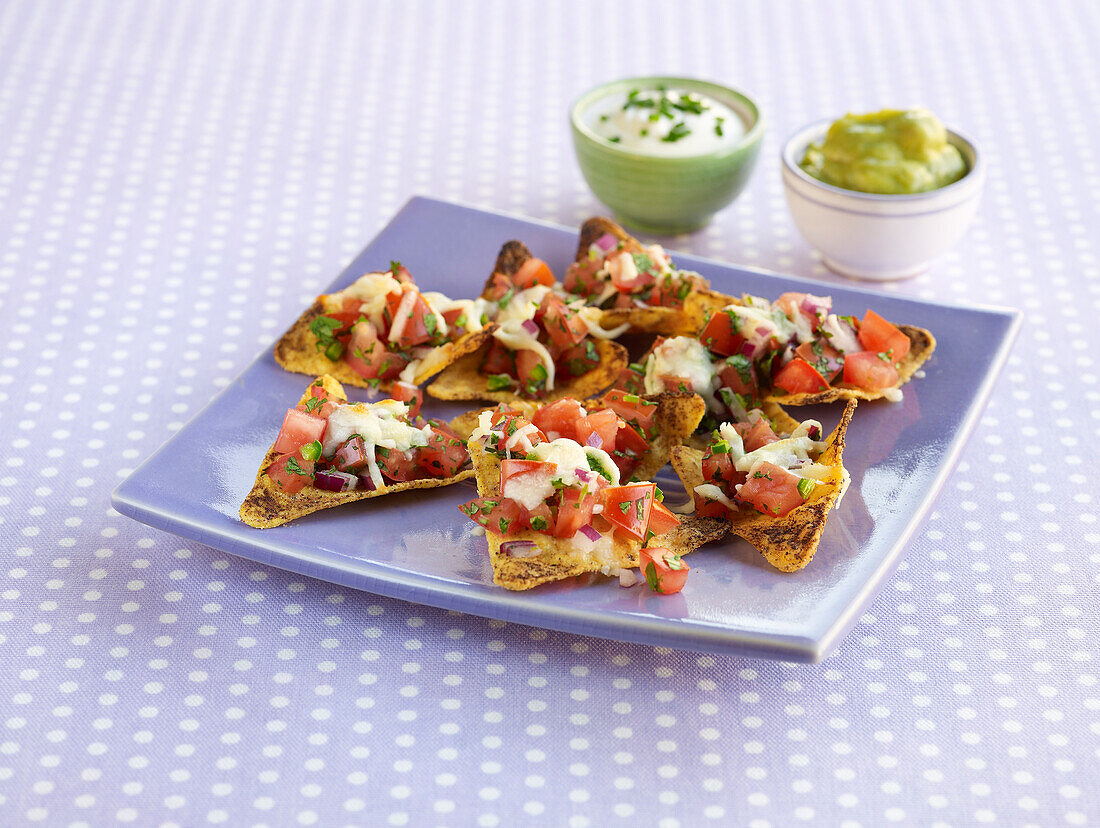 Nachos topped with salsa