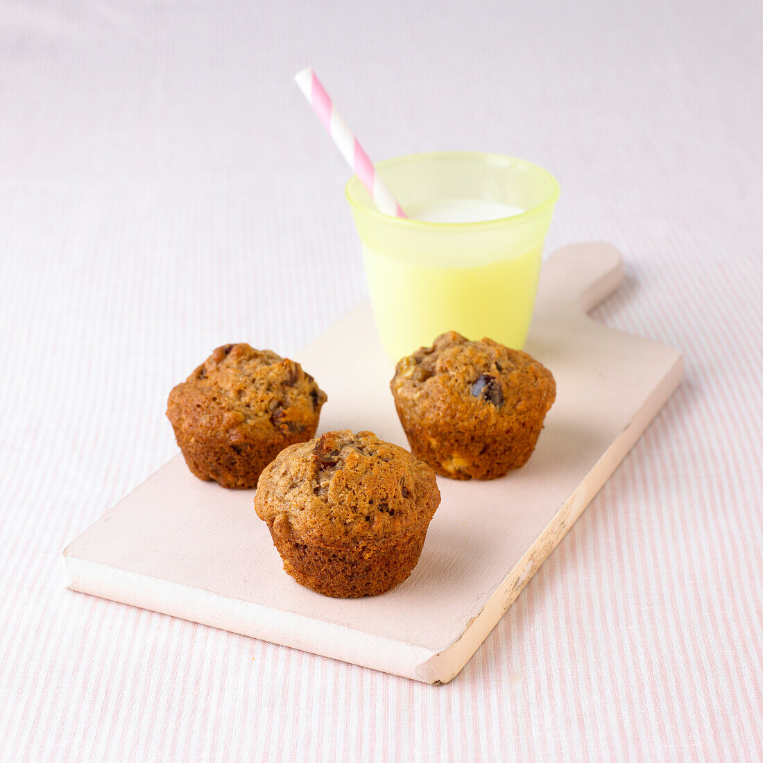 Mini muffins and glass of milk