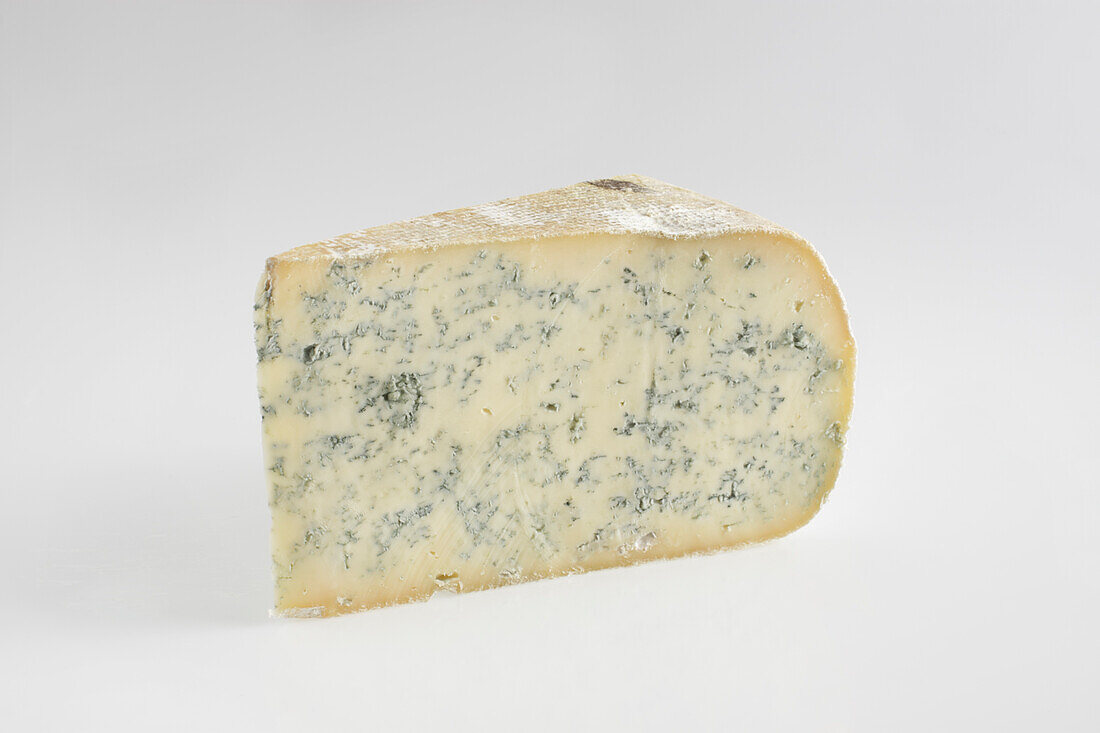 Slice of French bleu de gex cow's milk cheese