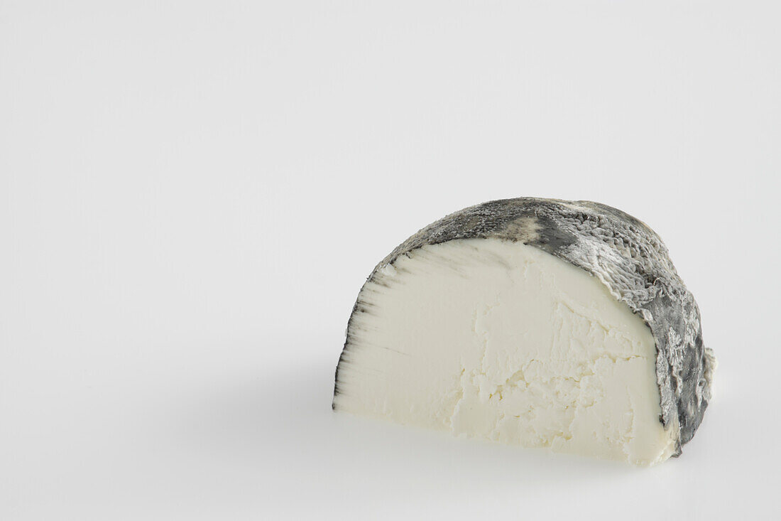 Sliced round of French ventadour goat's cheese