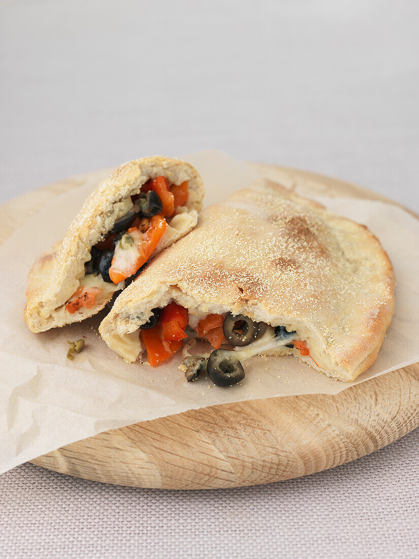 Calzone with peppers, capers, and olives