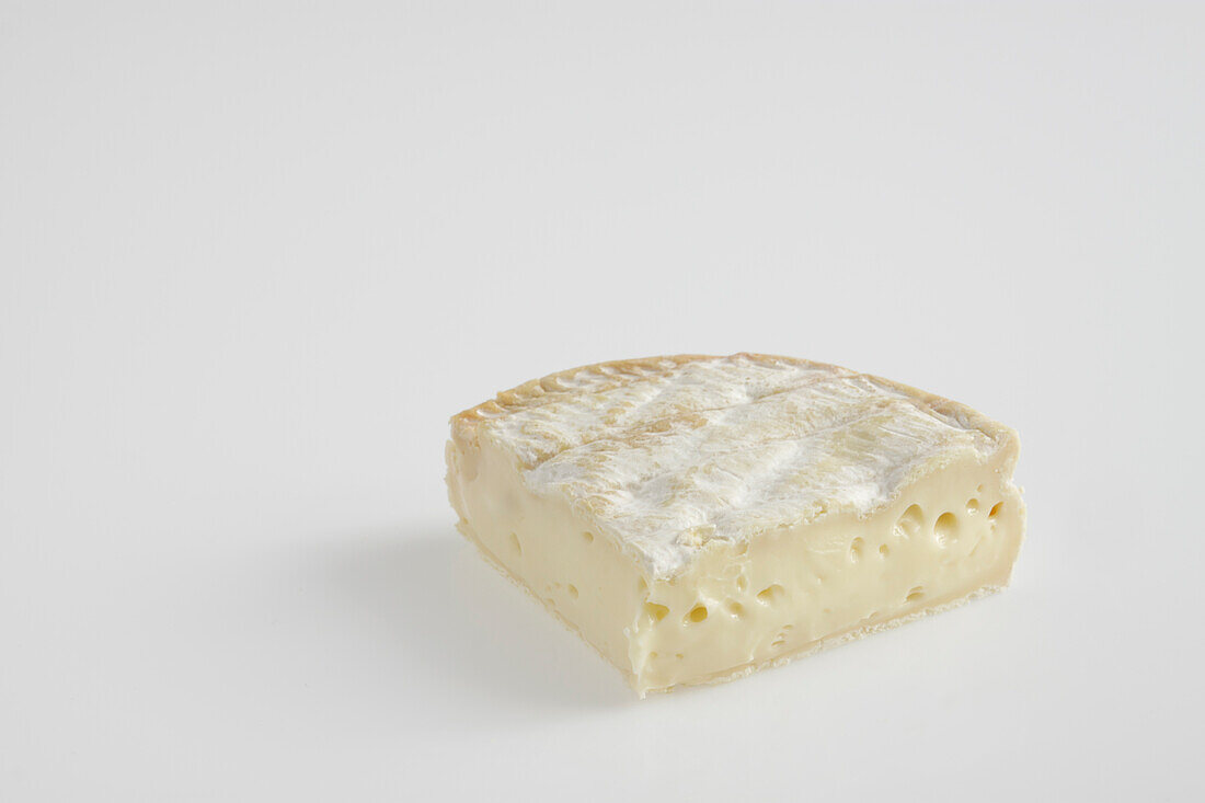 Slice of French saint-Jacques cow's milk cheese