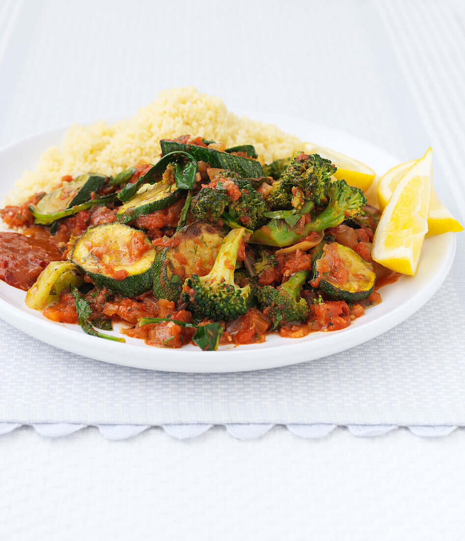 Courgette, broccoli, herb, and lemon tagine with couscous