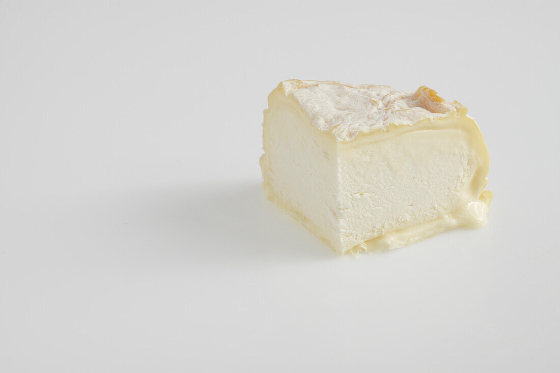 Slice of French Saint-Florentin cow's milk cheese
