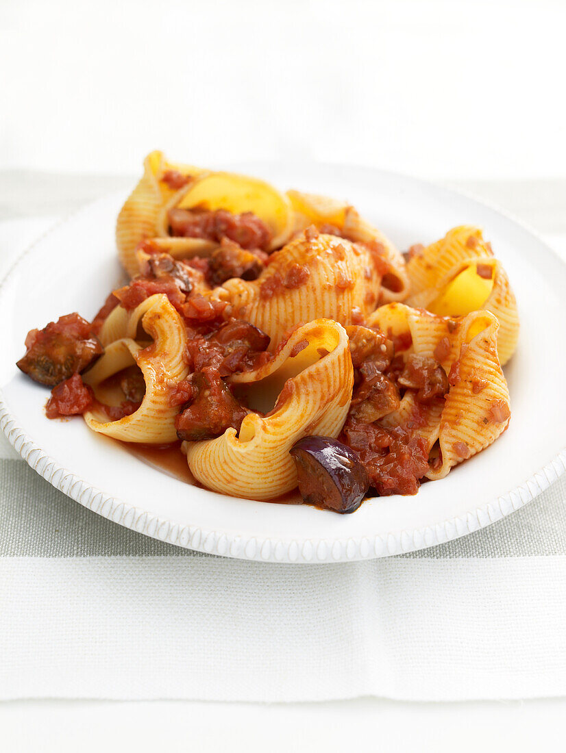 Pasta shells with aubergine and tomato sauce