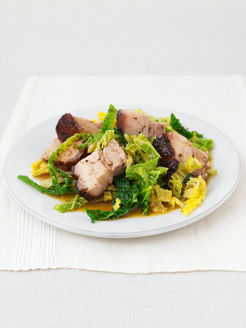 Spicy pork with caraway seeds and cabbage