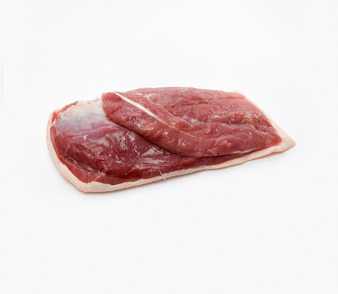 Raw duck breast with red meat exposed