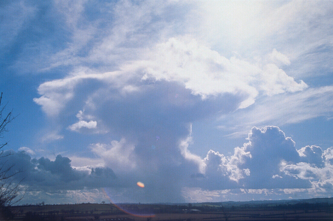 Distant vigorous cumulonimbus clouds