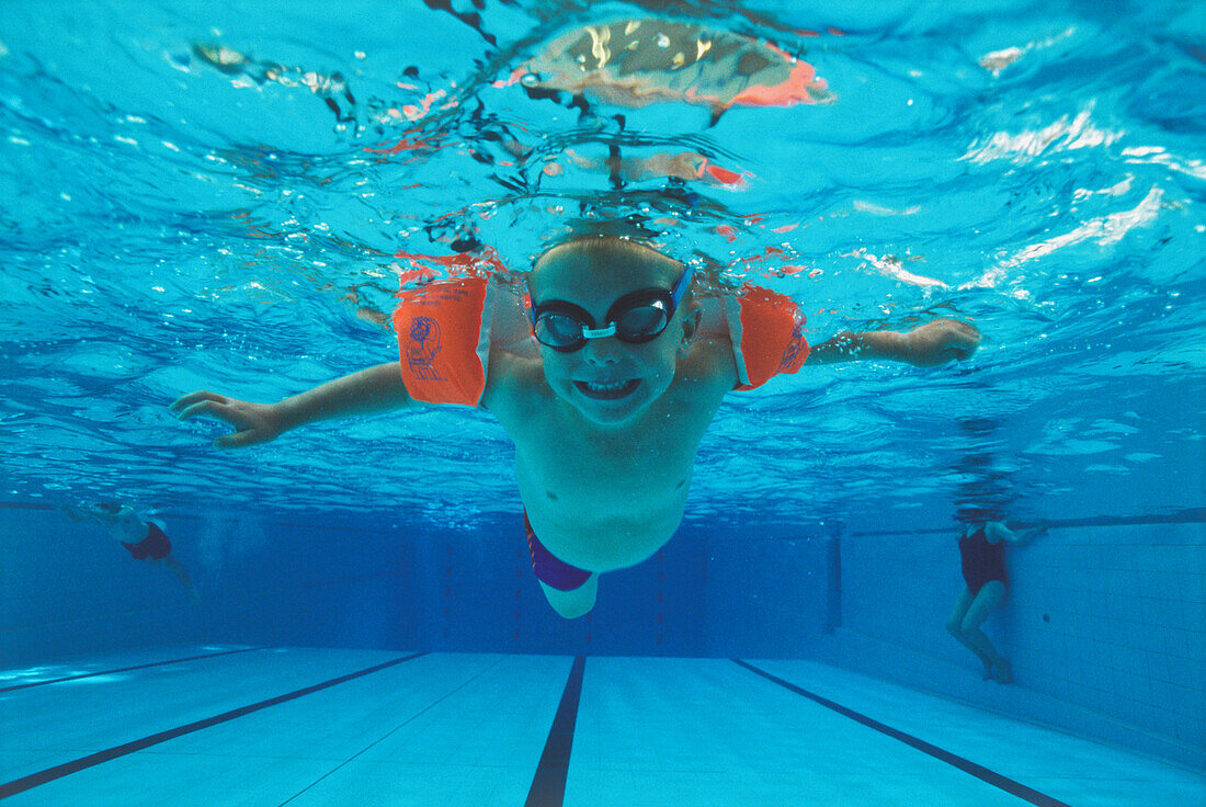 Boy swimming underwater