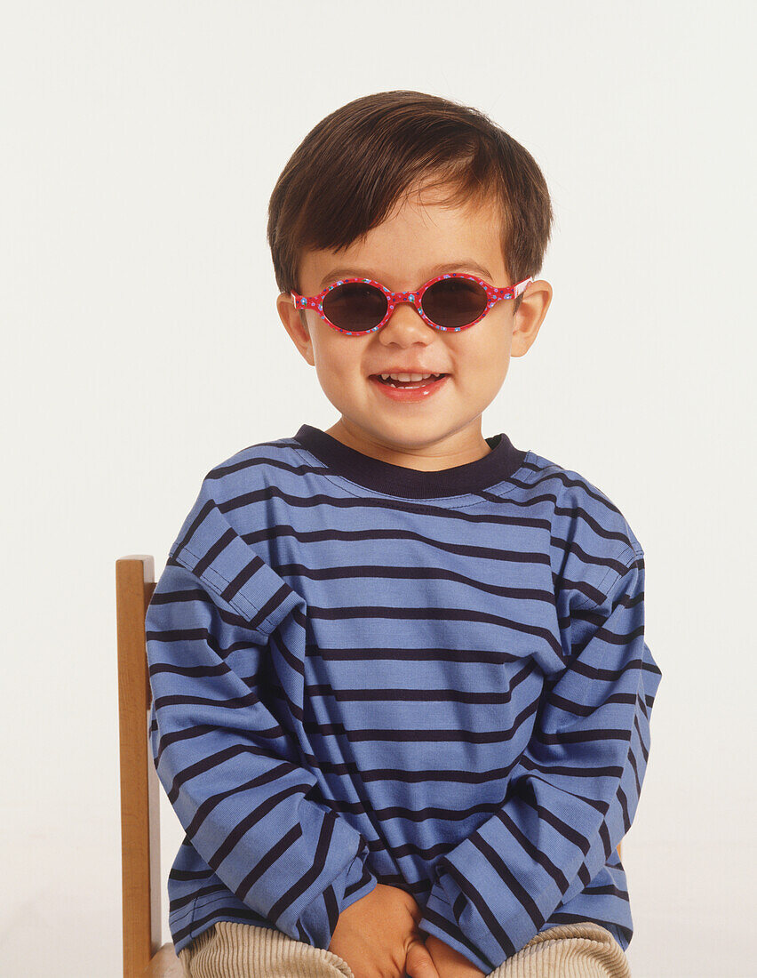 Smiling boy wearing sunglasses
