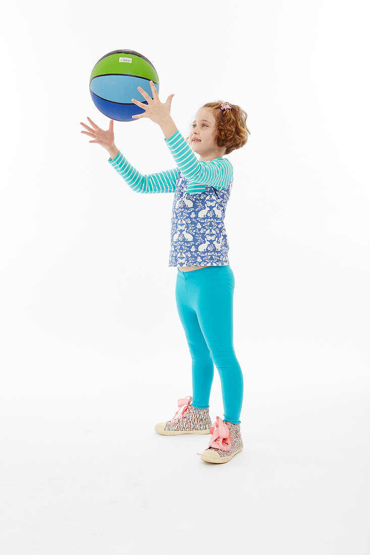 Girl playing with ball