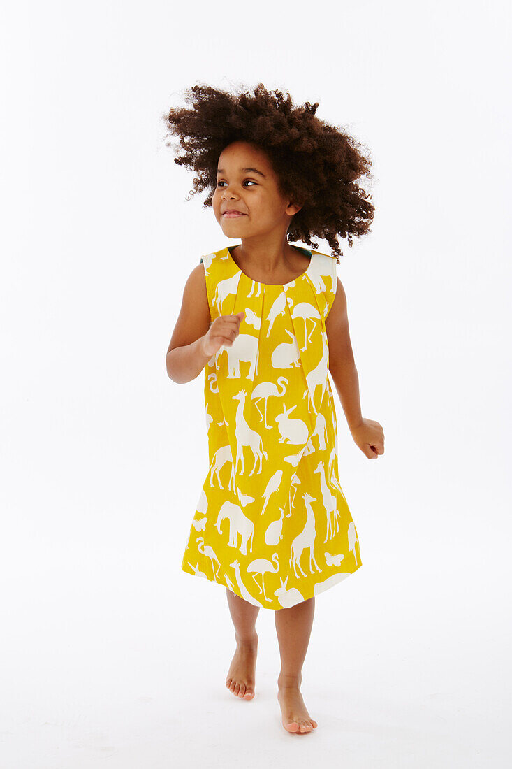 Little girl in yellow dress
