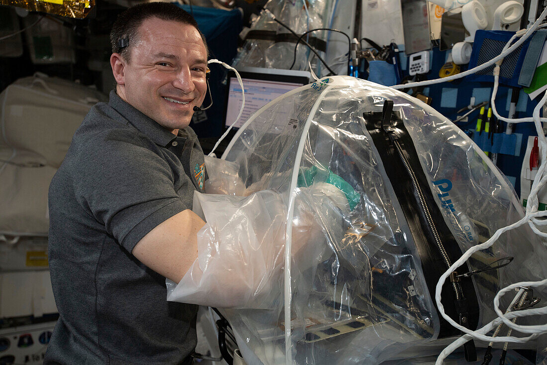 NASA astronaut conducting cardiac research on the ISS
