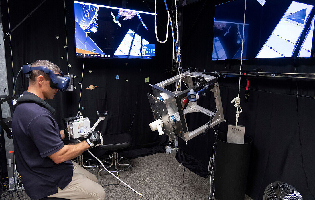 NASA astronaut practising spacewalk with virtual reality