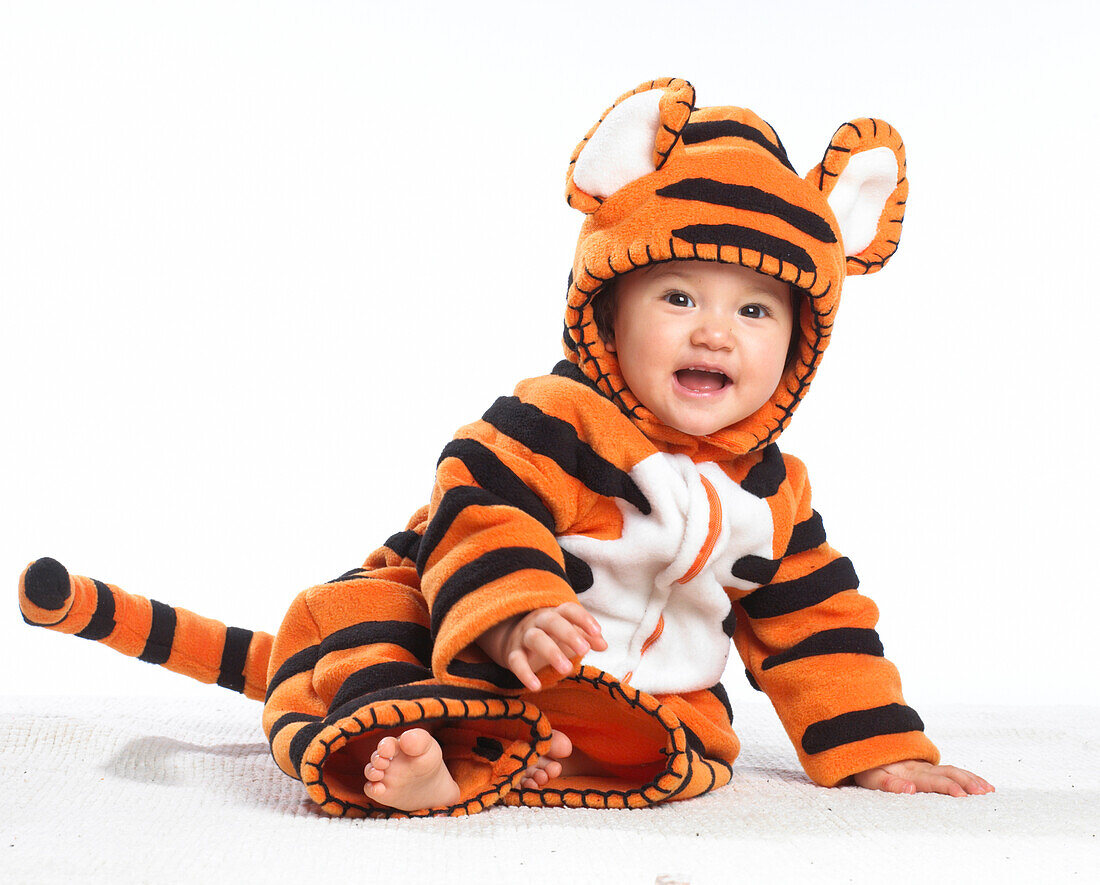 Baby girl wearing tiger suit