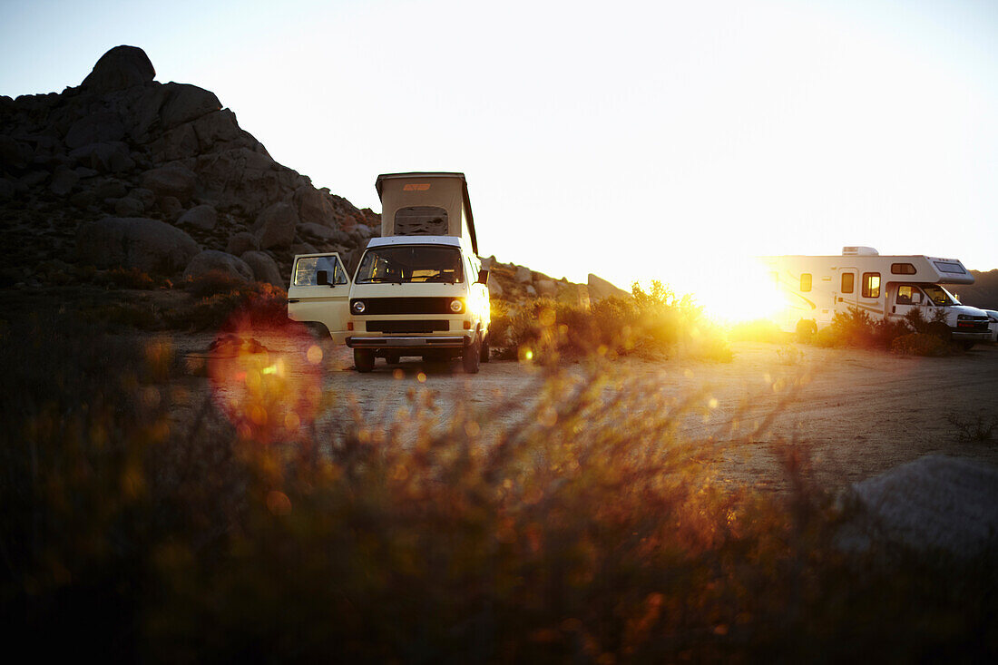 A camper van at sunset