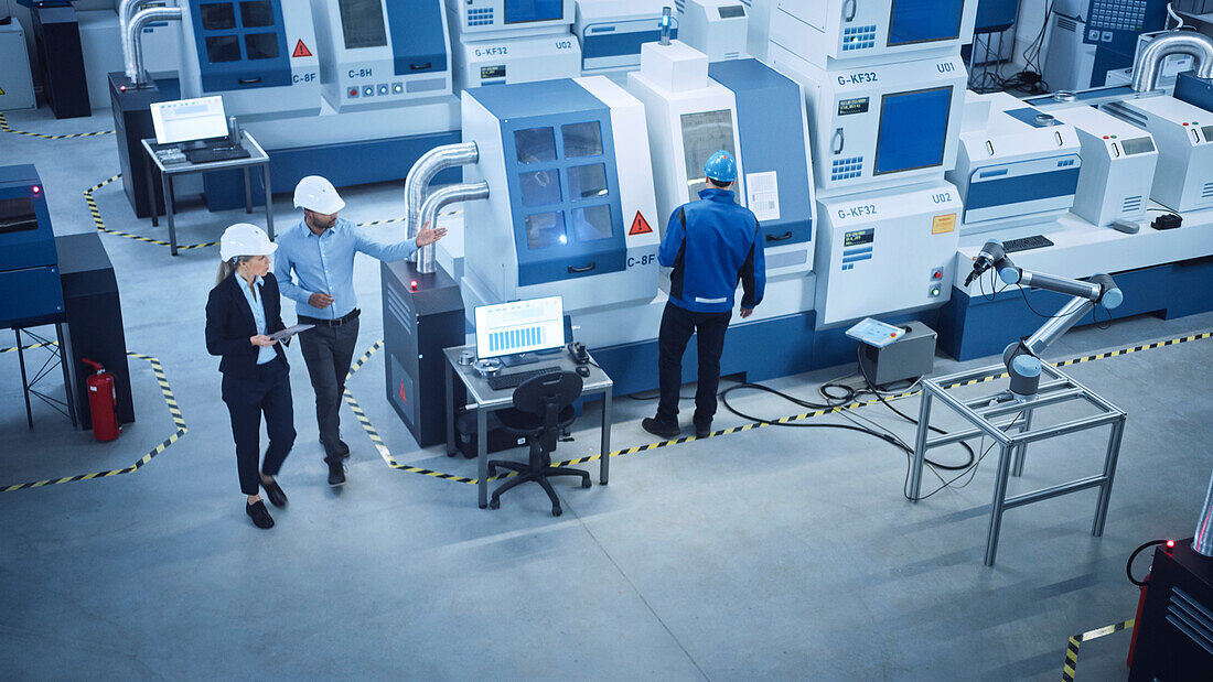 Manager and engineer inspecting a facility