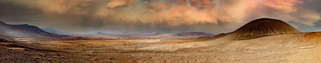 Desert panorama with mountain peaks