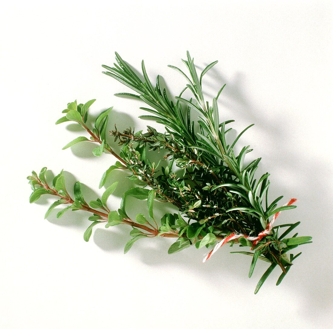 Oregano, rosemary and thyme, tied in a bunch