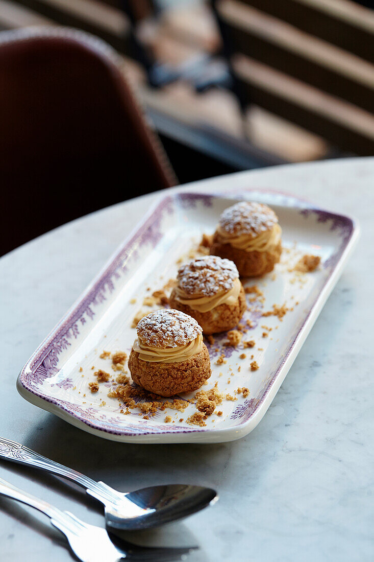 Salted caramel profiteroles