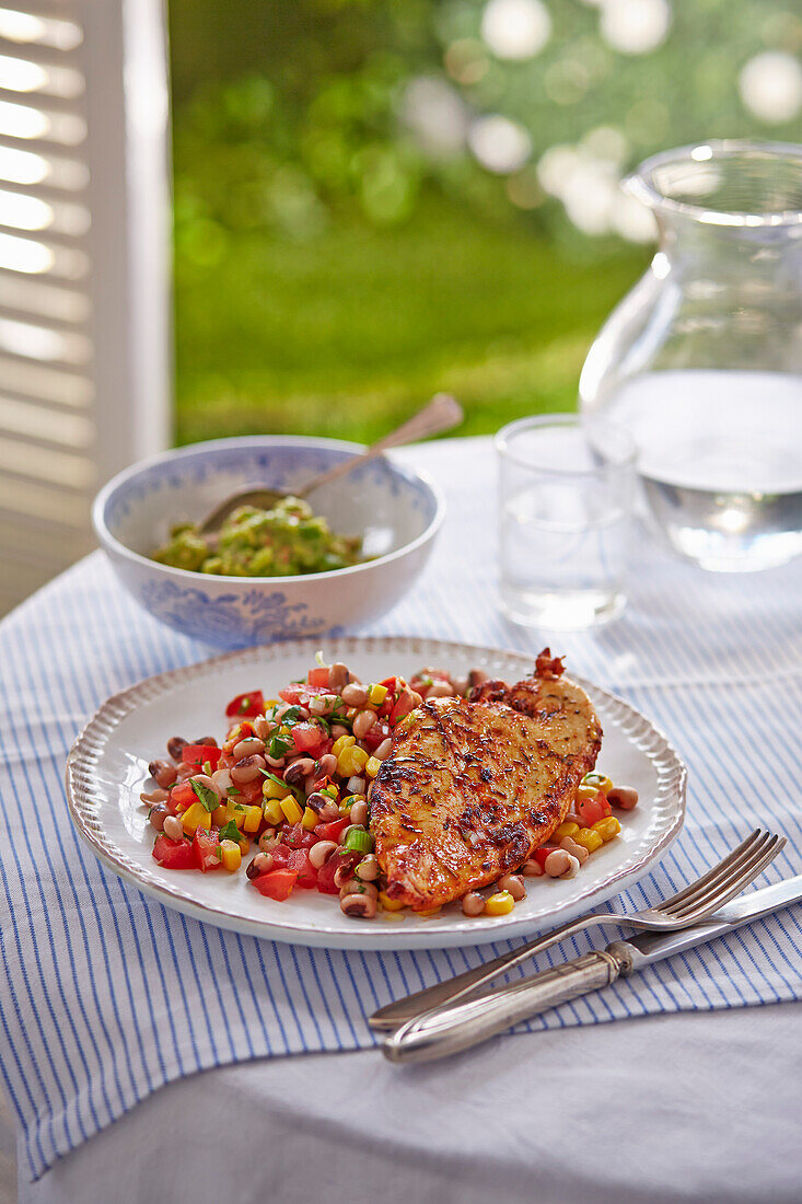 Cajun grilled chicken with lime black-eyed bean salad and guacamole