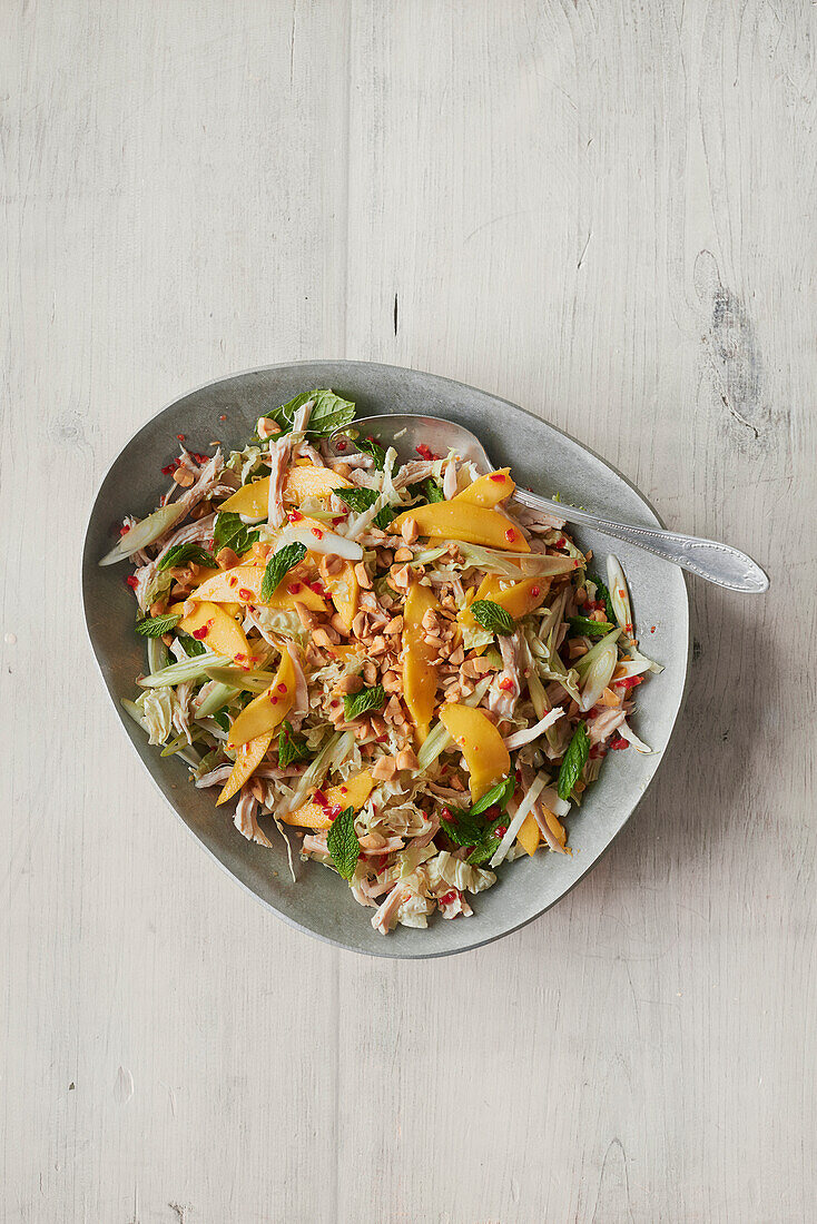 Thai chicken salad with mango and peanuts