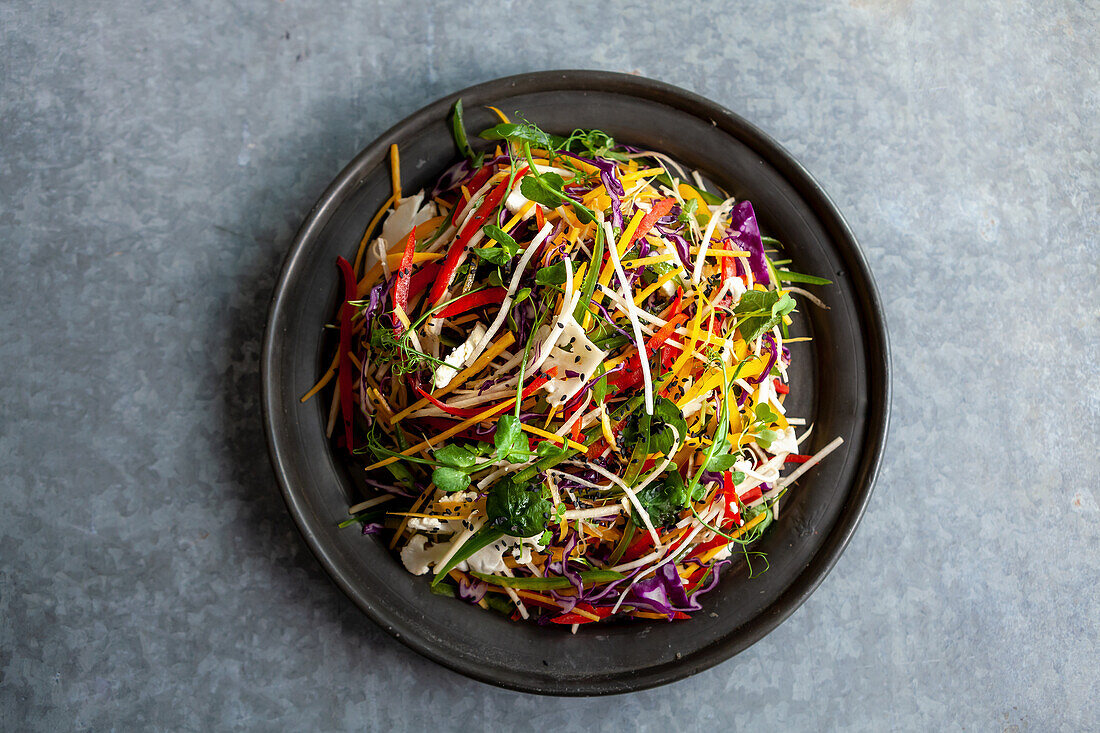Asian slaw with carrots, cauliflower, nigela seeds, radish and red cabbage