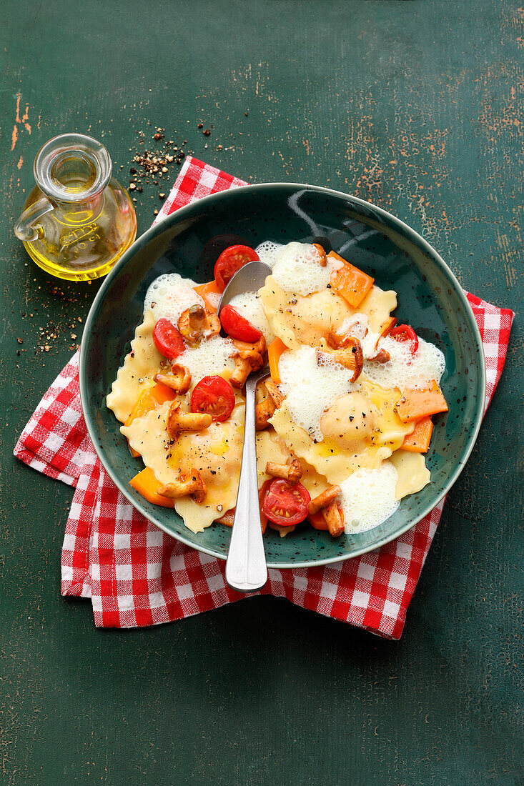 Italian pumpkin ricotta ravioli with parmesan sauce