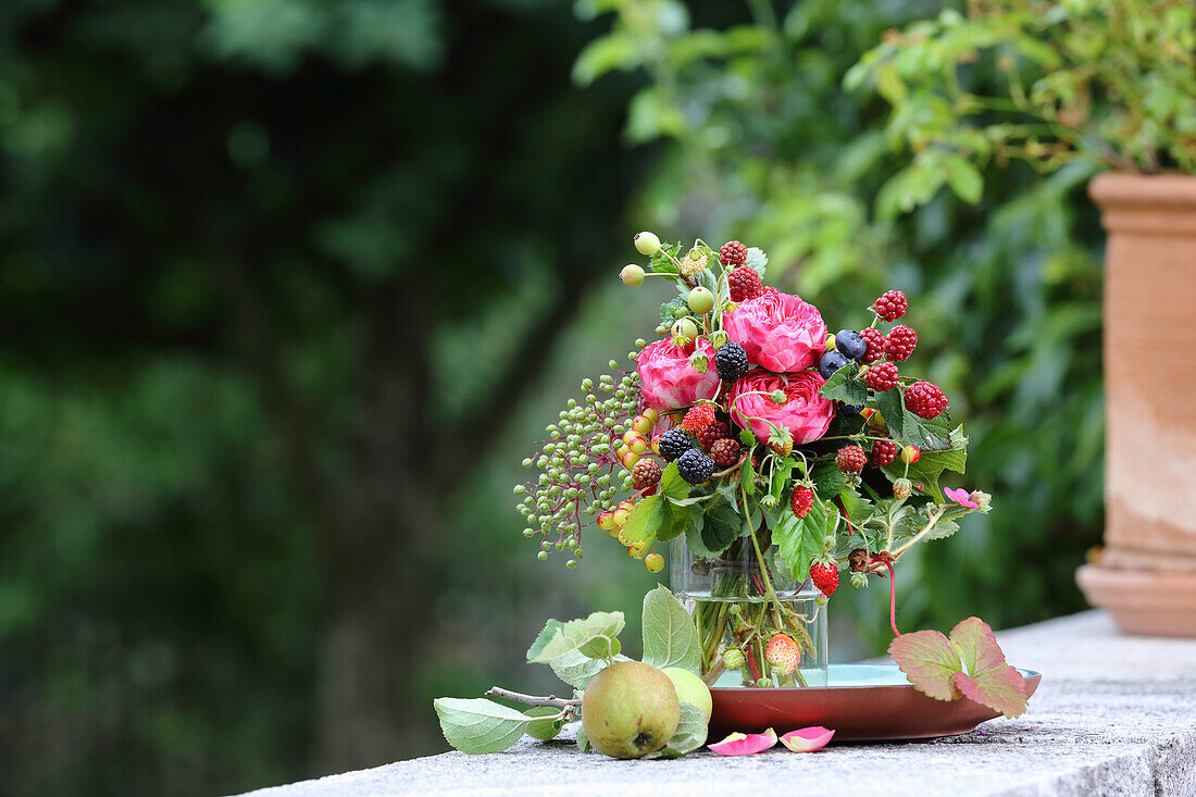 Bouquet of roses and blackberries