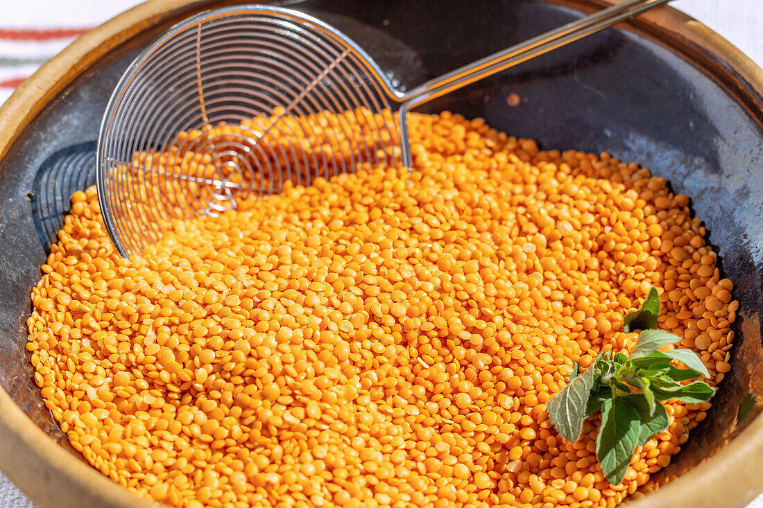 Red lentils in a ceramic bowl