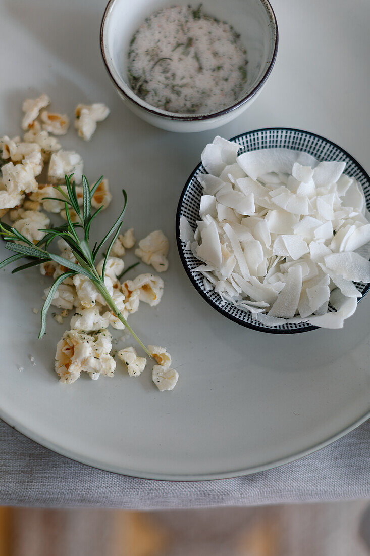 Salted rosemary popcorn and coconut chips