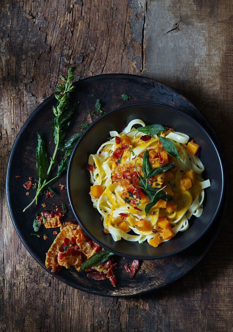 Ribbon noodles with mango, bacon, and sage